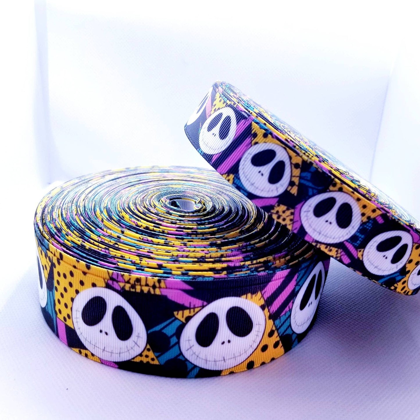 7/8" and 1.5" Jack Skellington with Rag Doll Sally Background Grosgrain Ribbon. Jack and Sally Halloween Nightmare Before Christmas Ribbon.